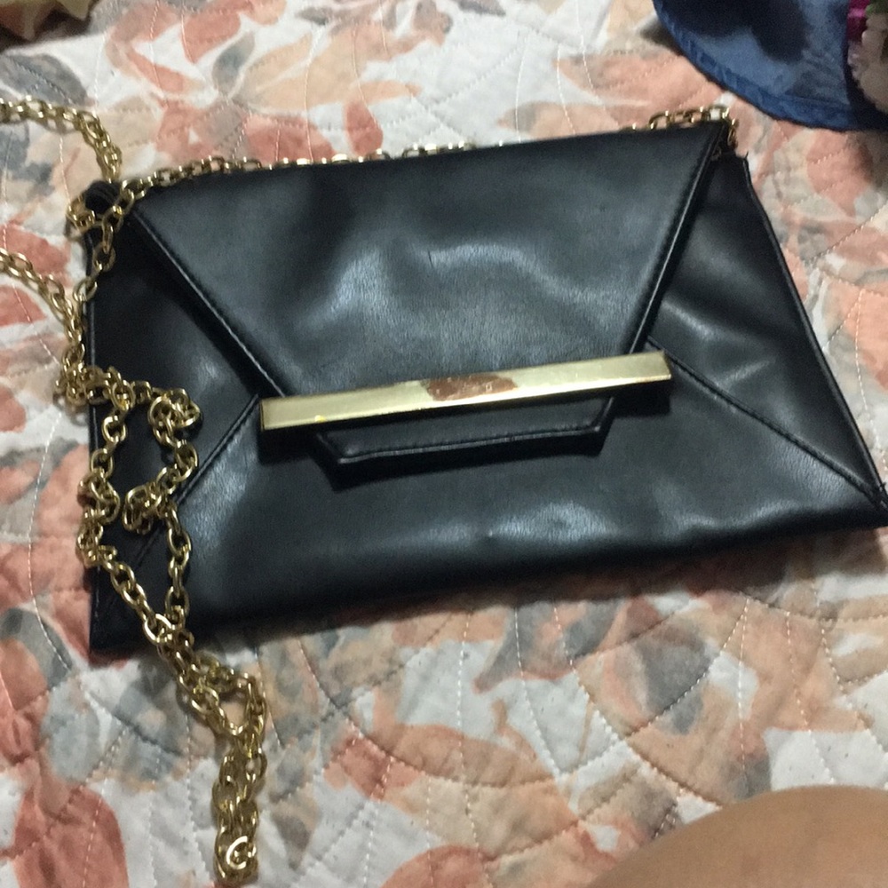Black purse, with  gold chain